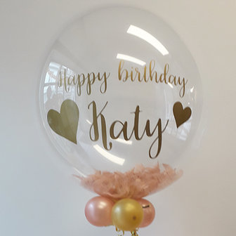 Lovedeco - Bubble ballon met eigen tekst gevuld met veren, happy birthday Katy rosé goud en goud